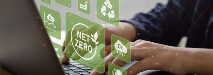 Businessman using computer to manage online information about net zero concept. natural environment neutral carbon A climate-neutral long-term strategy greenhouse gas emissions targets