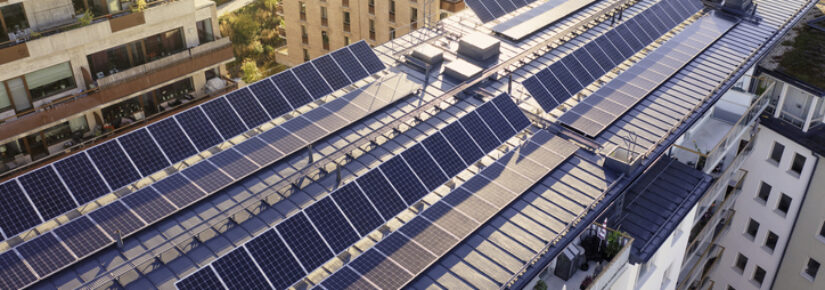 Solar panels on the roof of an apartment building